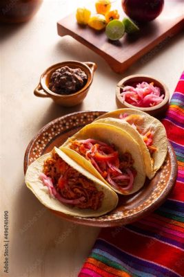  Cochinita Pibil: Ein mexikanisches Schmorgericht voller exotischer Aromen und saftiger Zartheit!