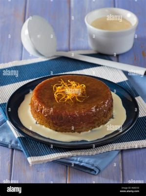  Malva Pudding: Ein süßer Traum aus Südafrika, der mit fruchtiger Sauce und cremiger Vanillecreme verwöhnt!