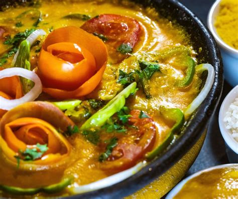  Moqueca de Peixe! Ein berauschend aromatisches und cremiges Seafood-Erlebnis aus den Tiefen des Amazonas